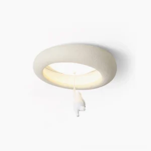 Little bear pendant ceiling light with frosted resin shade and warm ambient glow, overhead studio view