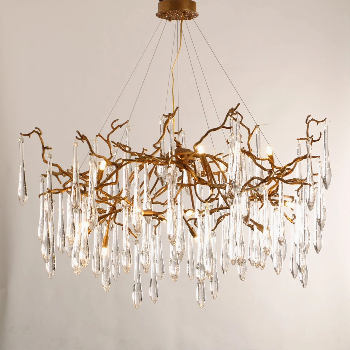 Compact Livio Chandelier (65cm) in home library setting, combining functional illumination with artistic focal point