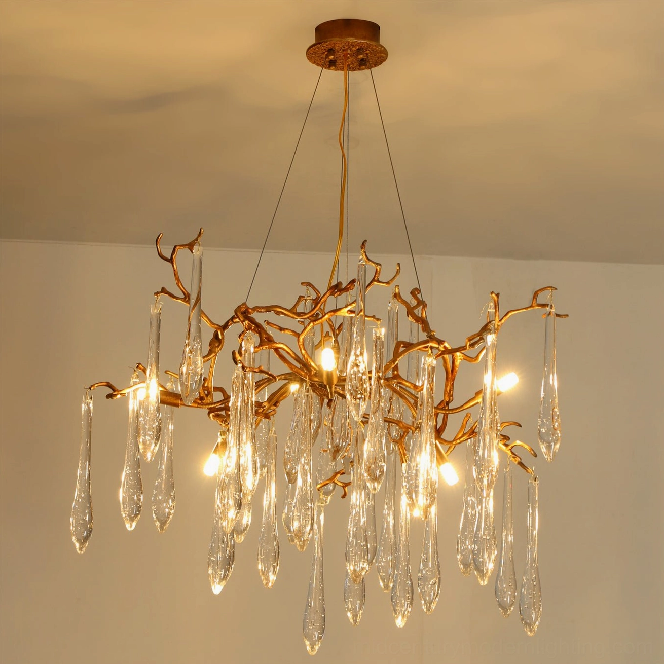 Livio Crystal Chandelier specification sheet showing dimensions in centimeters and inches for all three sizes