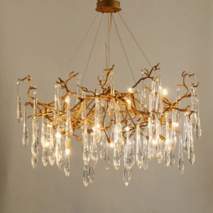 Overhead close-up of Livio Chandelier showing intricate brass branch structure and crystal pendant illumination