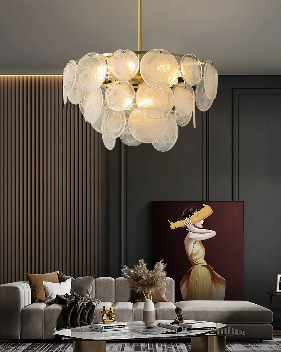 Loire Chandelier glowing above sectional sofa in dark luxury modern living room with statement wall art and warm ambient lighting