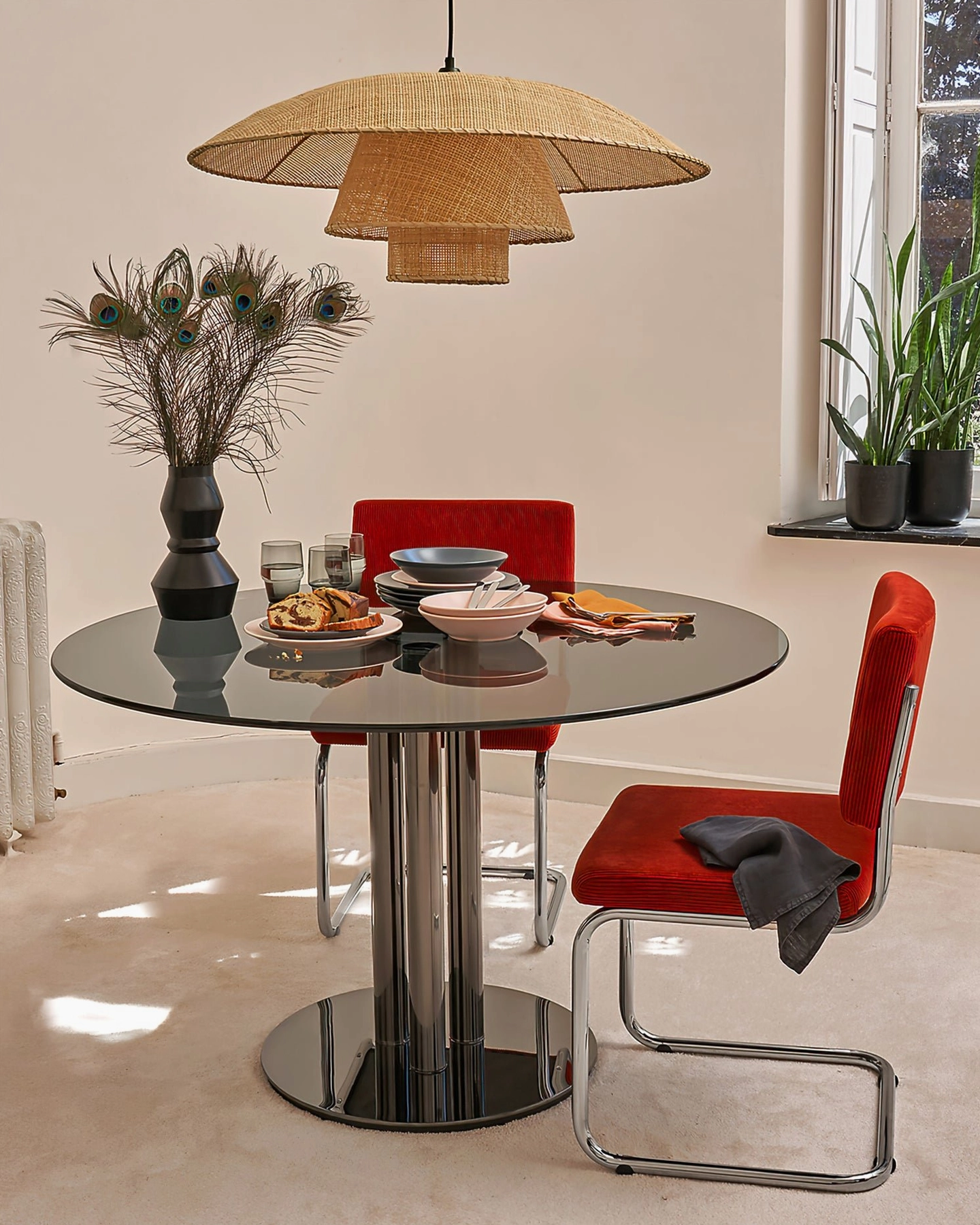 Natural bohemian rattan pendant lighting in modern dining room with overhead wide angle view