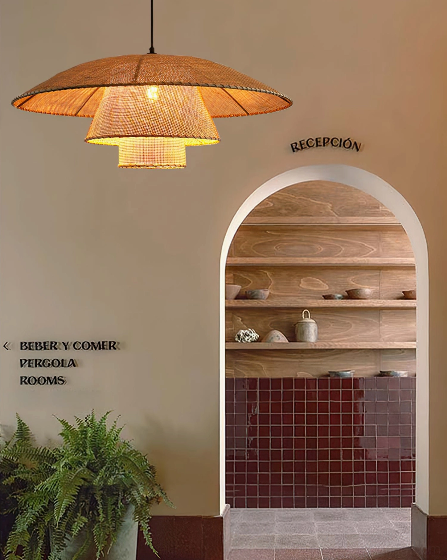 Lola handwoven rattan pendant lamp showcasing natural material quality and bohemian design aesthetic