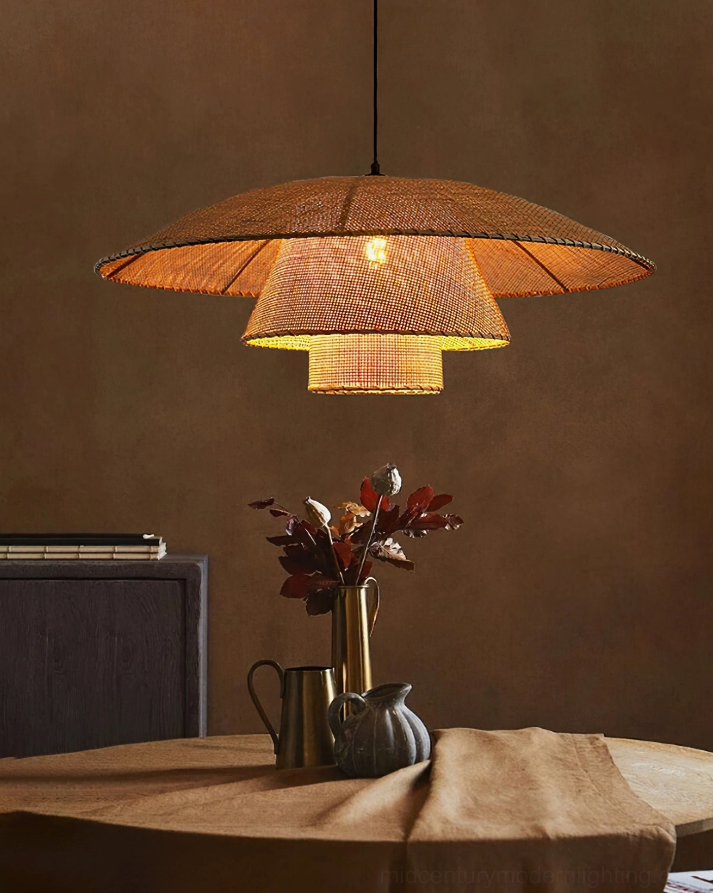 Lola rattan pendant lamp front studio shot displaying two-tier sculptural woven structure