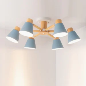 6-head Loona ceiling lamp installed in modern bedroom with blue matte shades and light wood arms creating ambient lighting