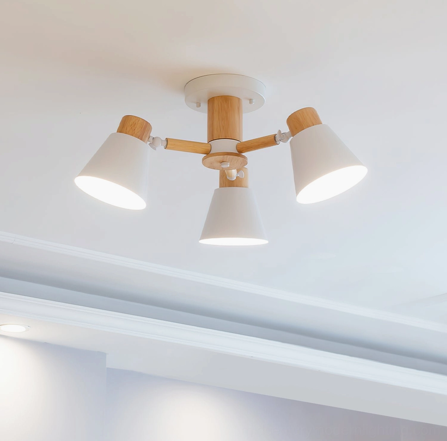 White Loona ceiling lamp installed above desk in modern home office with plants and minimalist artwork
