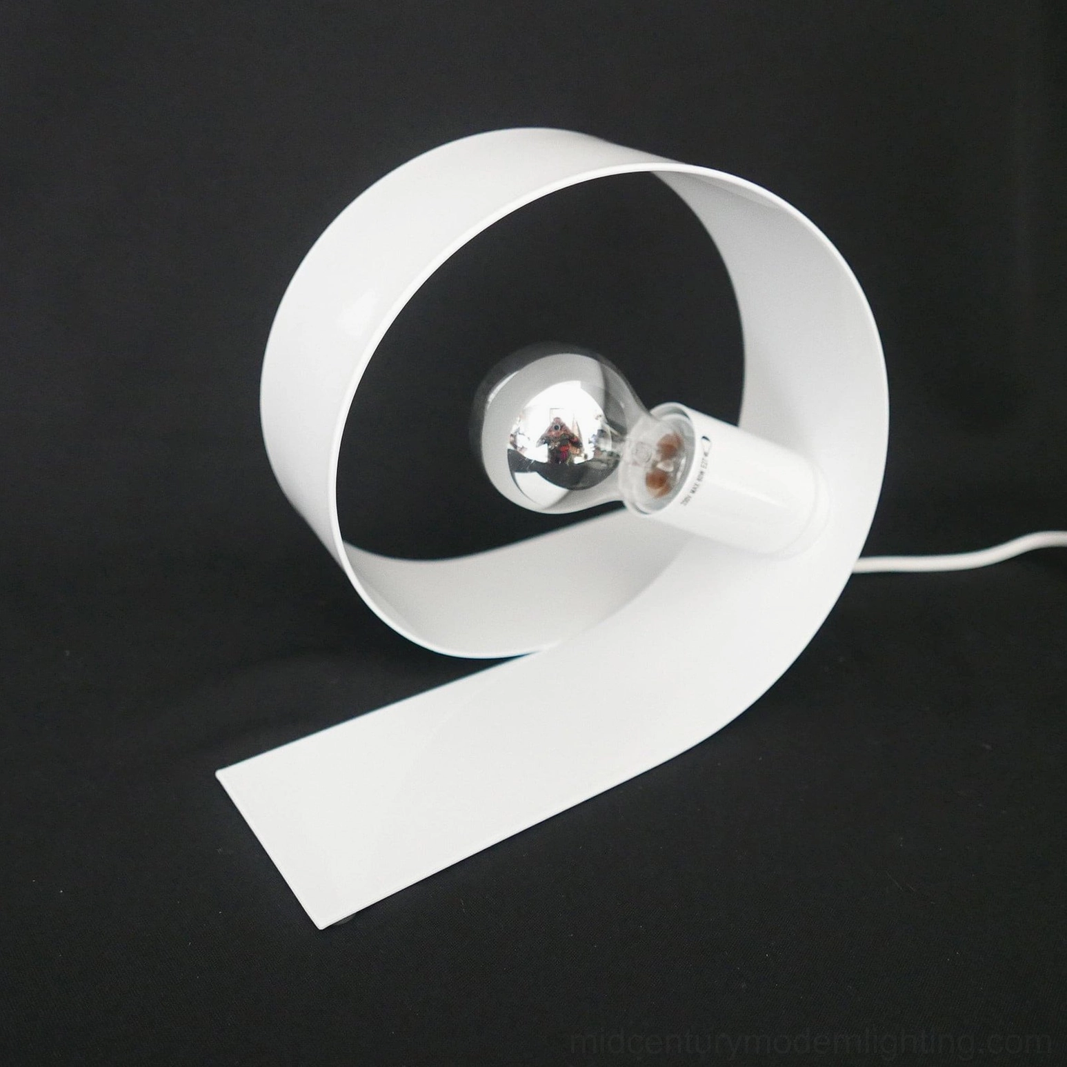 Looping table lamp mid-century modern design inspiration and style