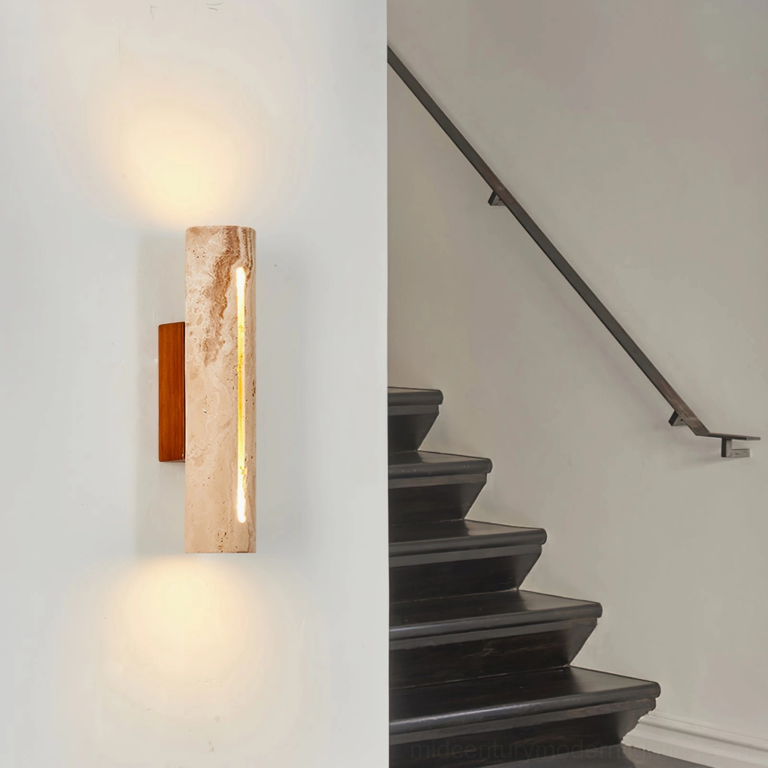 Lorelei travertine wall sconce installed in residential stairwell creating accent lighting with modern minimalist aesthetic