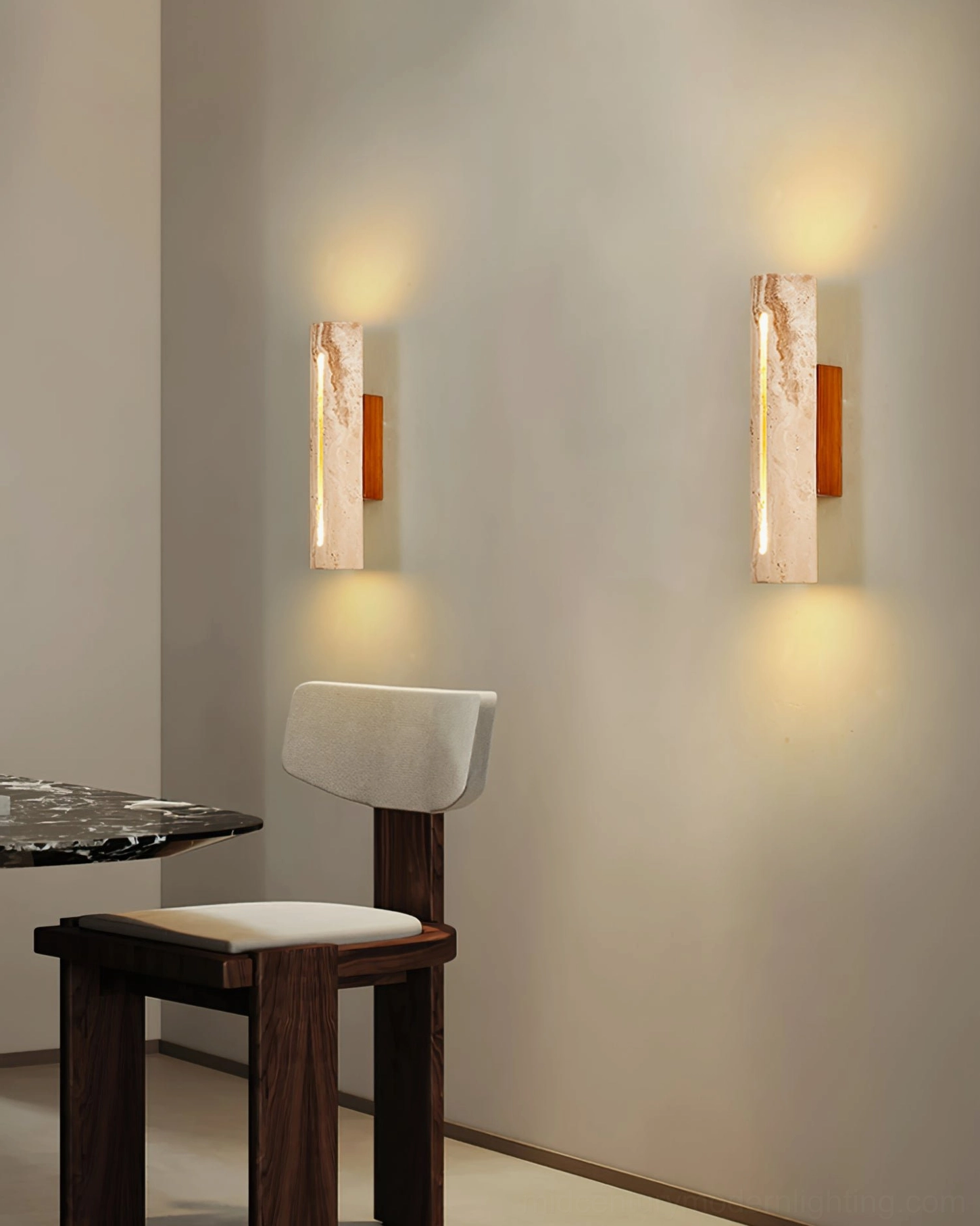 Lorelei travertine wall sconce displaying warm wooden backplate and natural stone surface craftsmanship