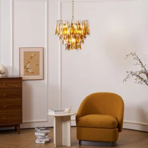 Illuminated Lorena glass chandelier in mid-century modern living room, warm amber glow creating ambient lighting over contemporary decor