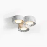 Loris triple clover ceiling light in warm walnut marble resin, top-down studio view