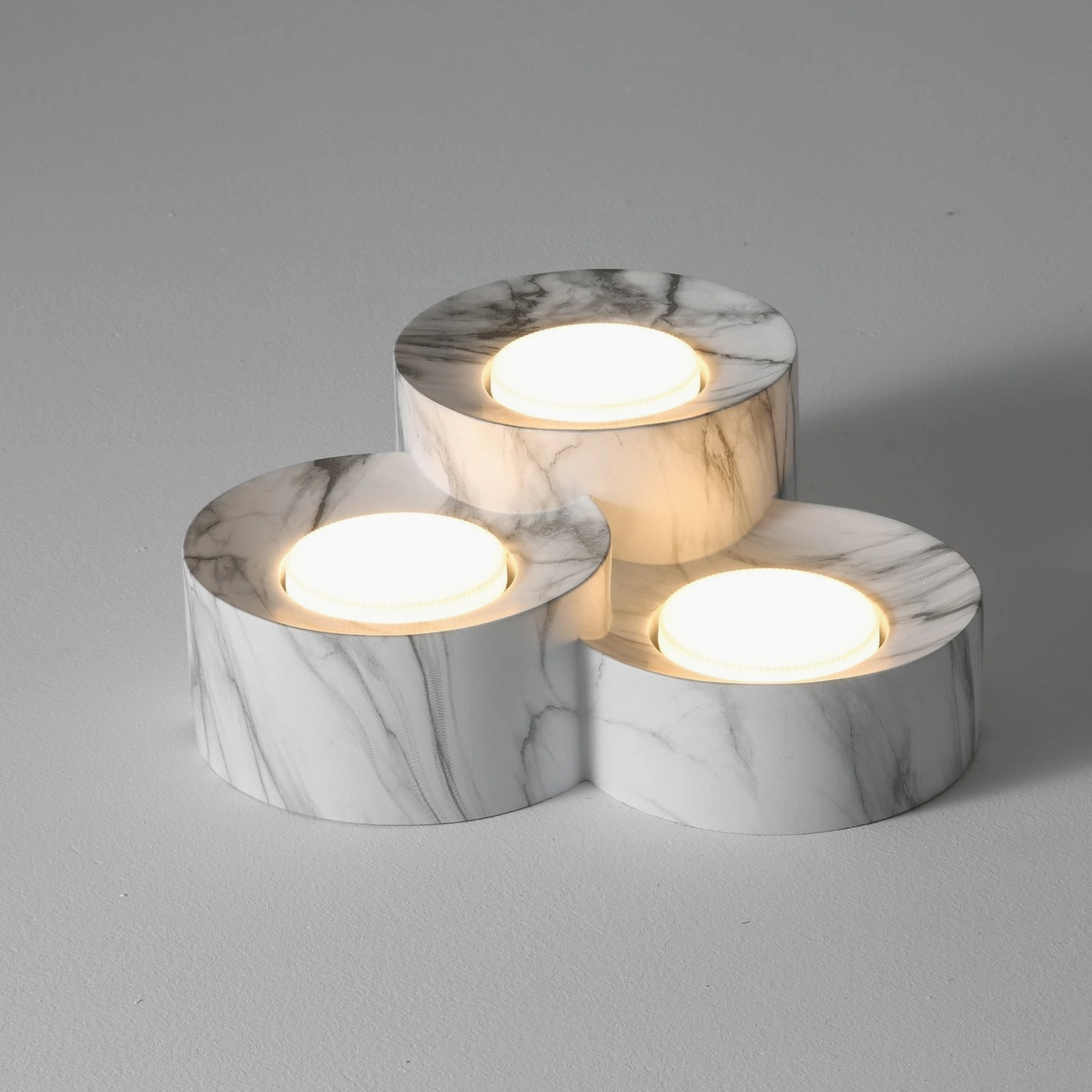Loris three-light grey marble ceiling fixture detail shot isolated