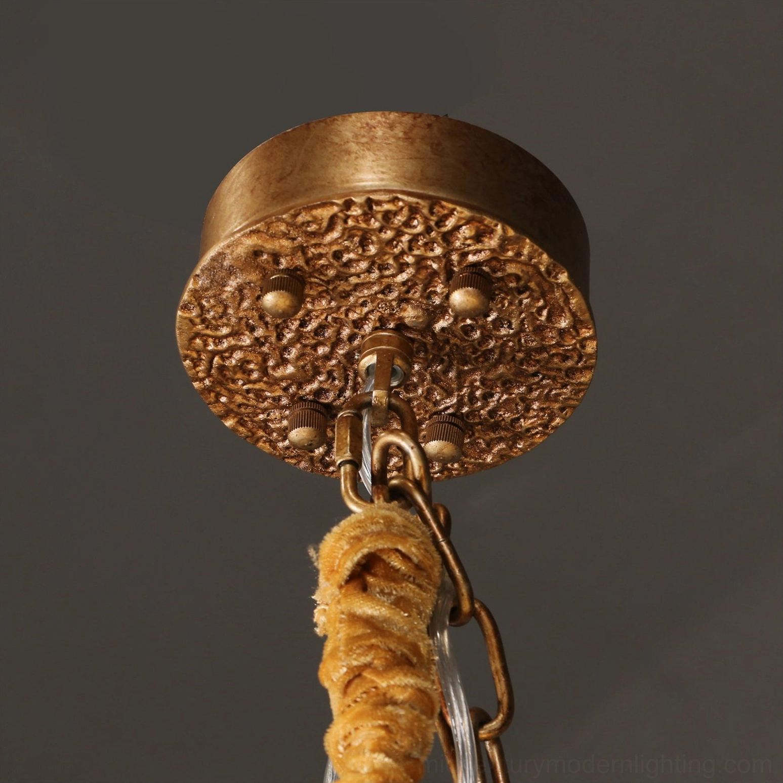 Mid-century modern brass chandelier in contemporary home interior