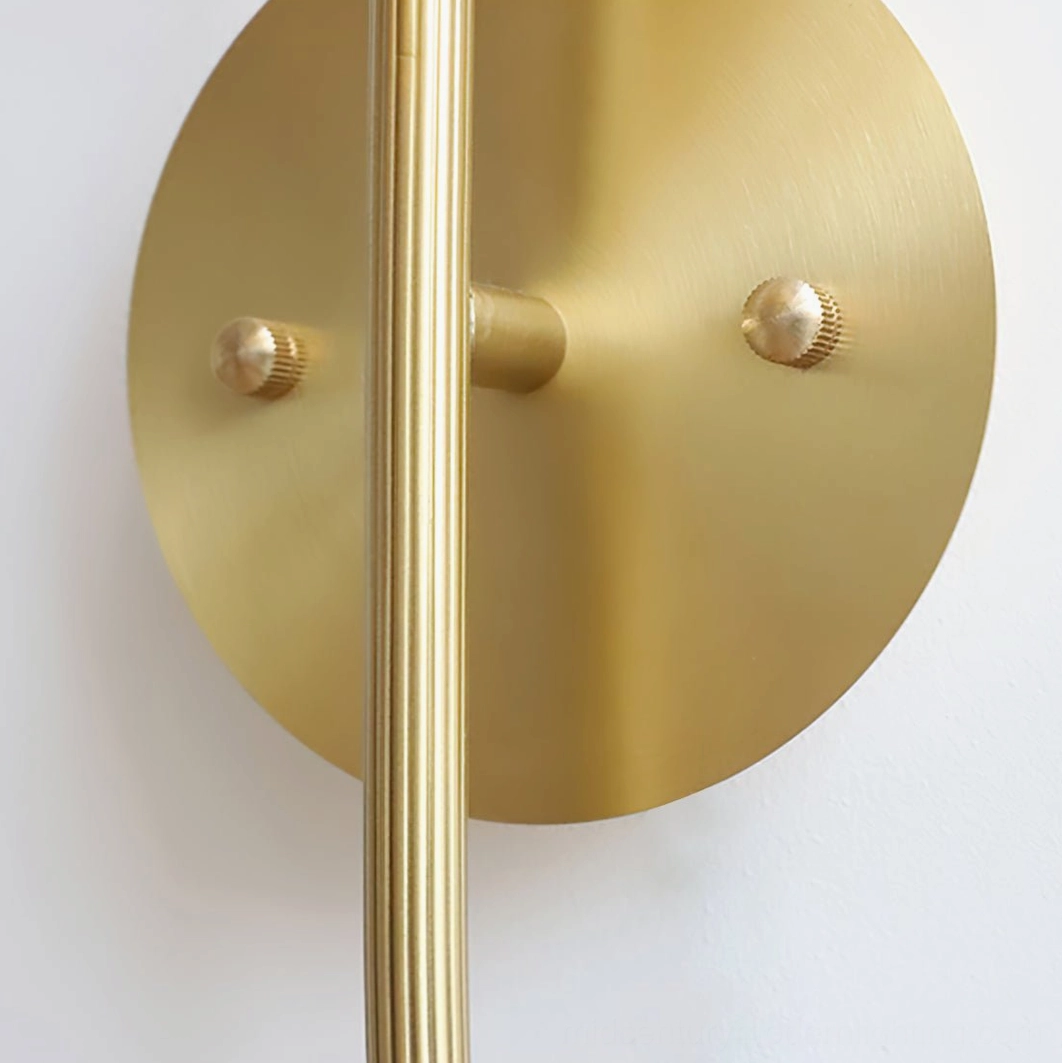 Lotus Amber Wall Sconce mounting base close-up showing brushed brass gold finish with two mounting screws and connected metal rod