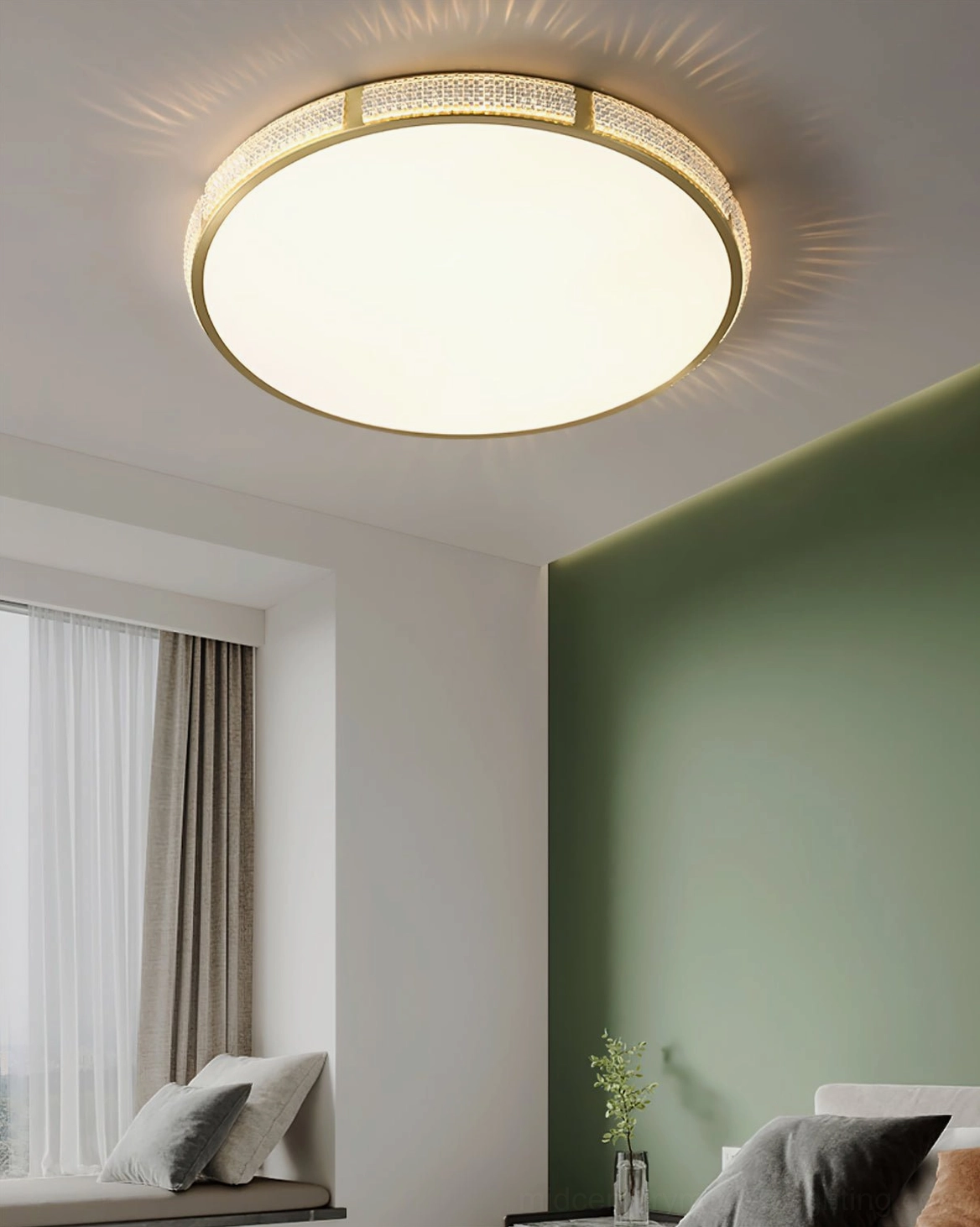 Lovate brass flush mount lamp in small bedroom with green accent wall, sleek gold trim frosted shade ambient light