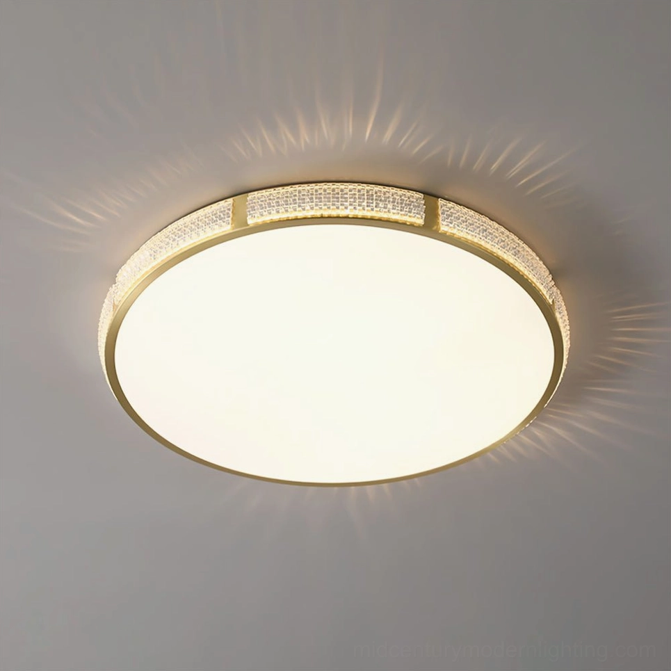 Lovate round brass ceiling lamp showcase angle showing sleek geometric form and premium material construction
