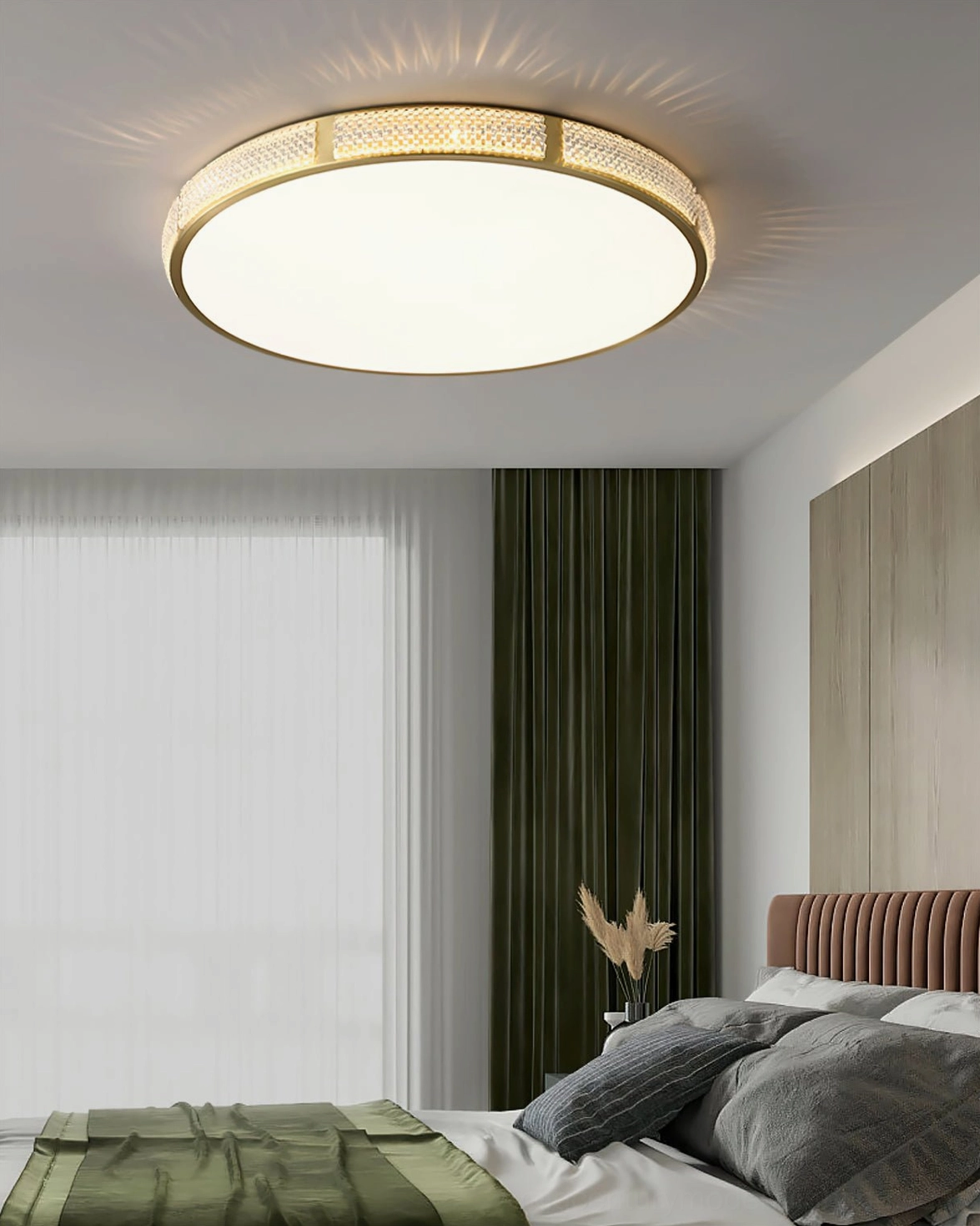 Lovate minimalist round ceiling lamp in bedroom with green bed linens and sheer curtains, gentle illumination