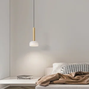LU gold pendant light with white glass shade suspended in modern bedroom, mid-century lighting fixture
