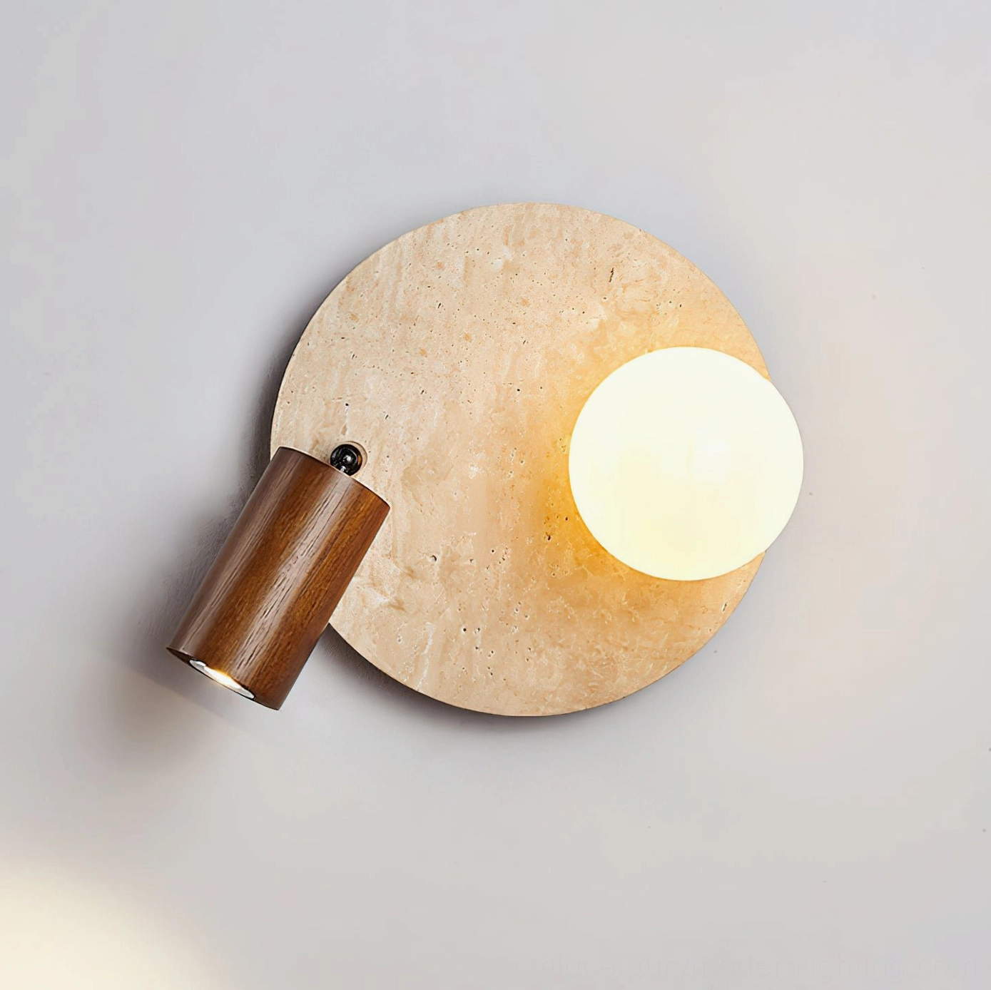 Luka Travertine Wall Lamp multiple angles showing circular travertine backplate natural beige stone and flexible wooden mounting options