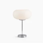 Lumi minimalist table lamp with frosted glass shade and silver chrome base, front view studio shot