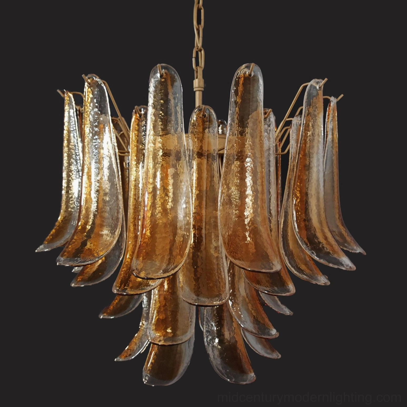 Amber-toned Luna chandelier overhead frontal view with thick textured hand-blown glass