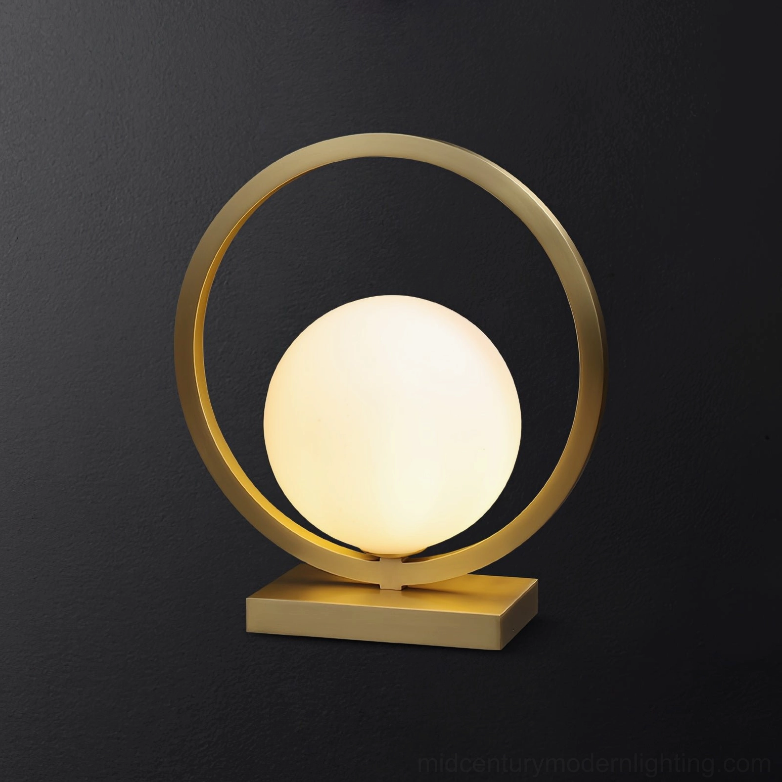 Lunar Brass Table Lamp unlit front view highlighting matte frosted glass dome and metal frame