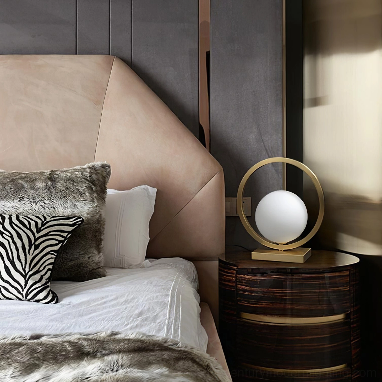 Mid-century brass table lamp beside leather headboard in master bedroom interior design setting