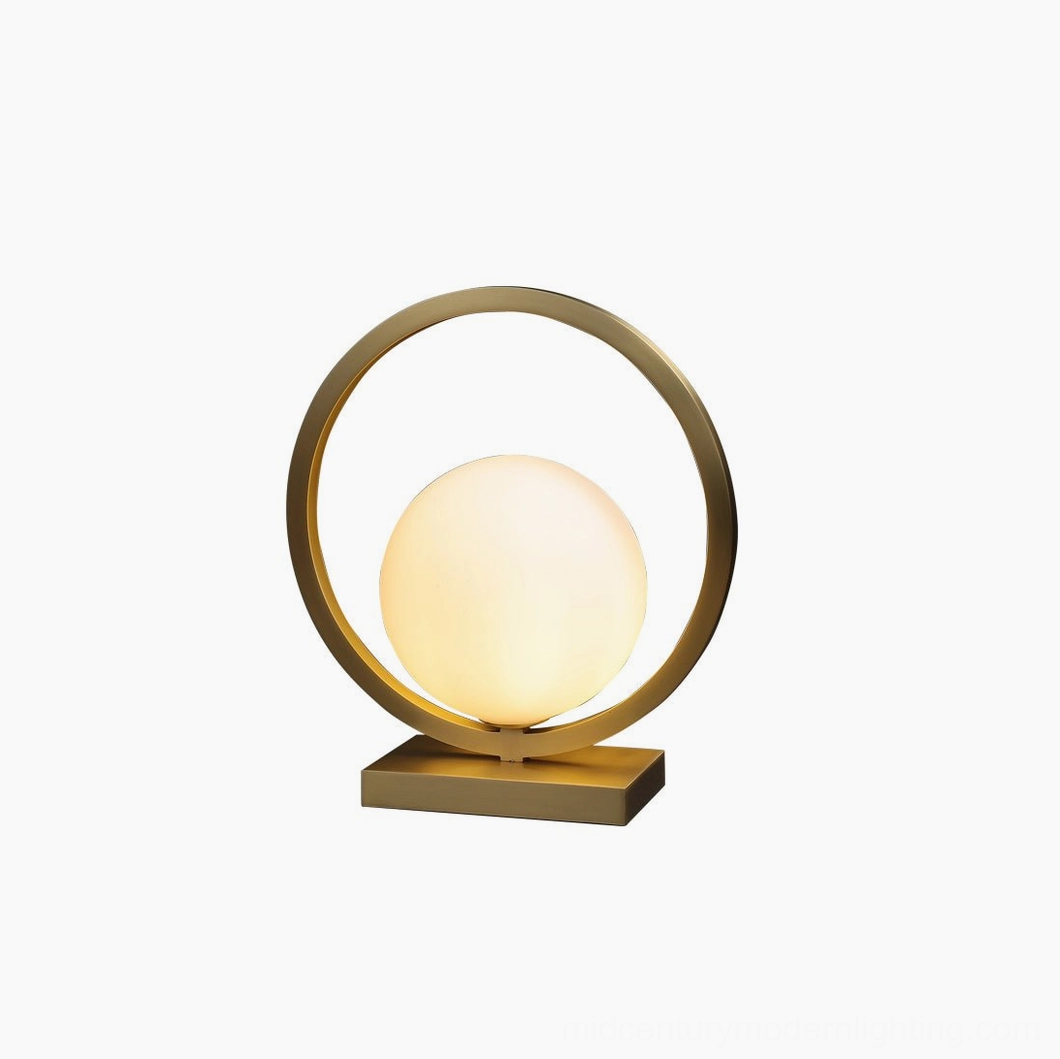 Lunar Brass Table Lamp featuring mid-century modern silhouette with premium brass and glass construction