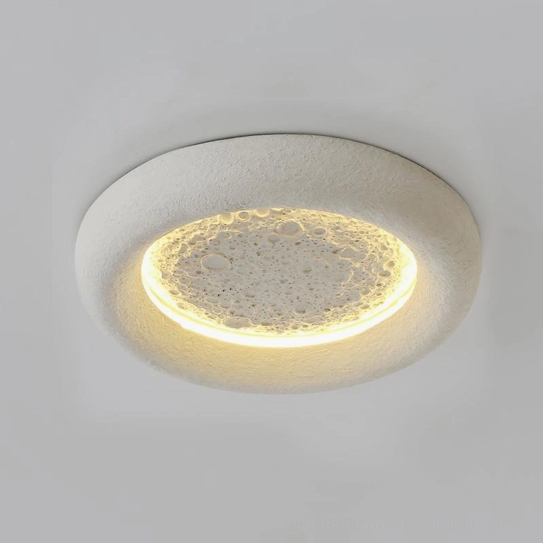 Lunar Glow ceiling light in Off-White finish creating ambient lighting in modern interior space