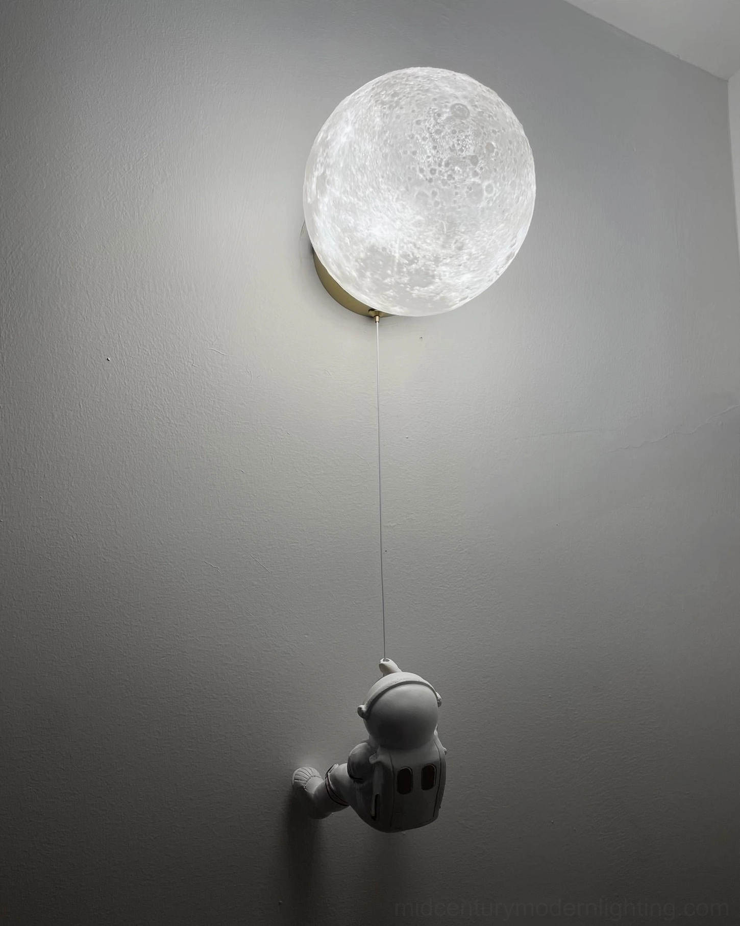 Close-up of lunar lampshade texture and resin astronaut decoration pendant
