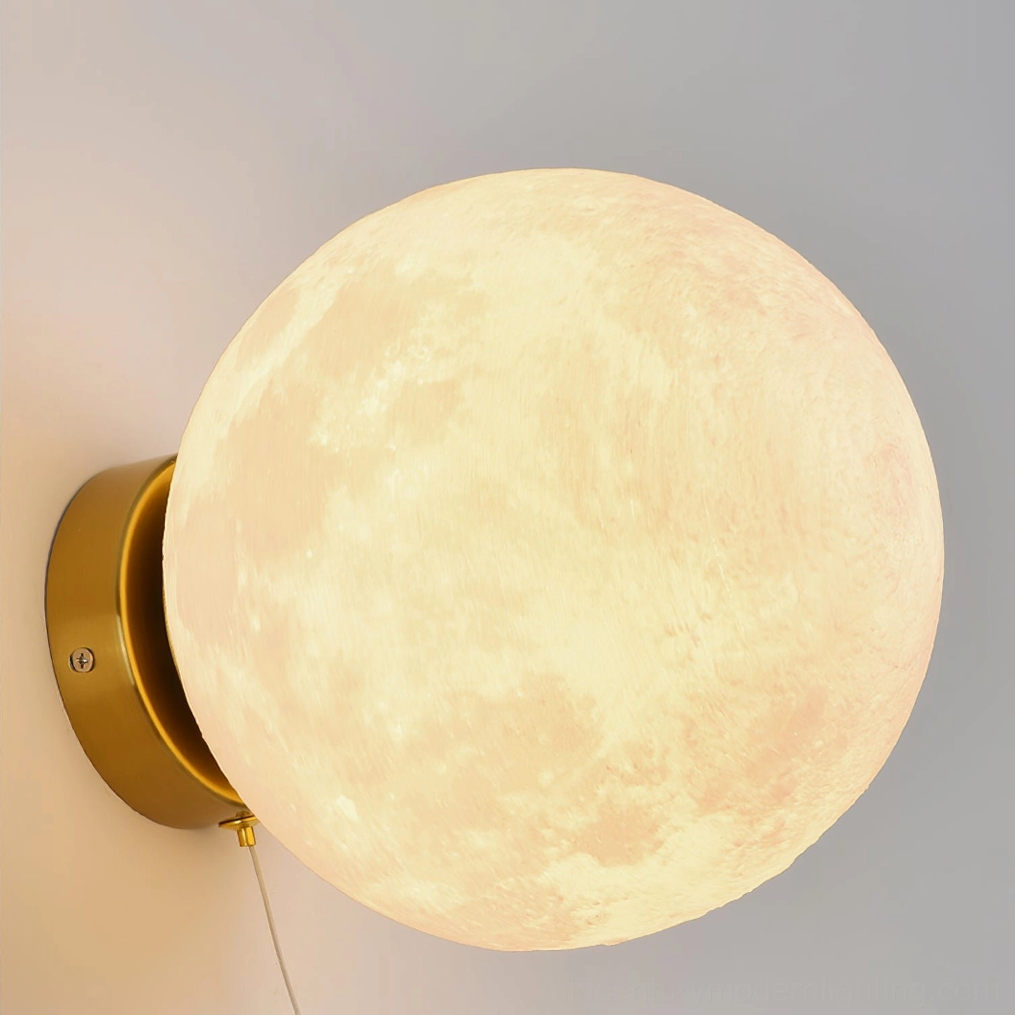Lunar globe wall sconce as artist studio focal point with creative workspace styling