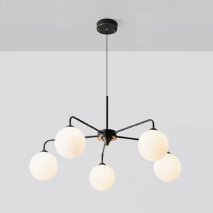 Overhead view of Lune 5-light globe pendant fixture with matte black metal framework and frosted glass orbs