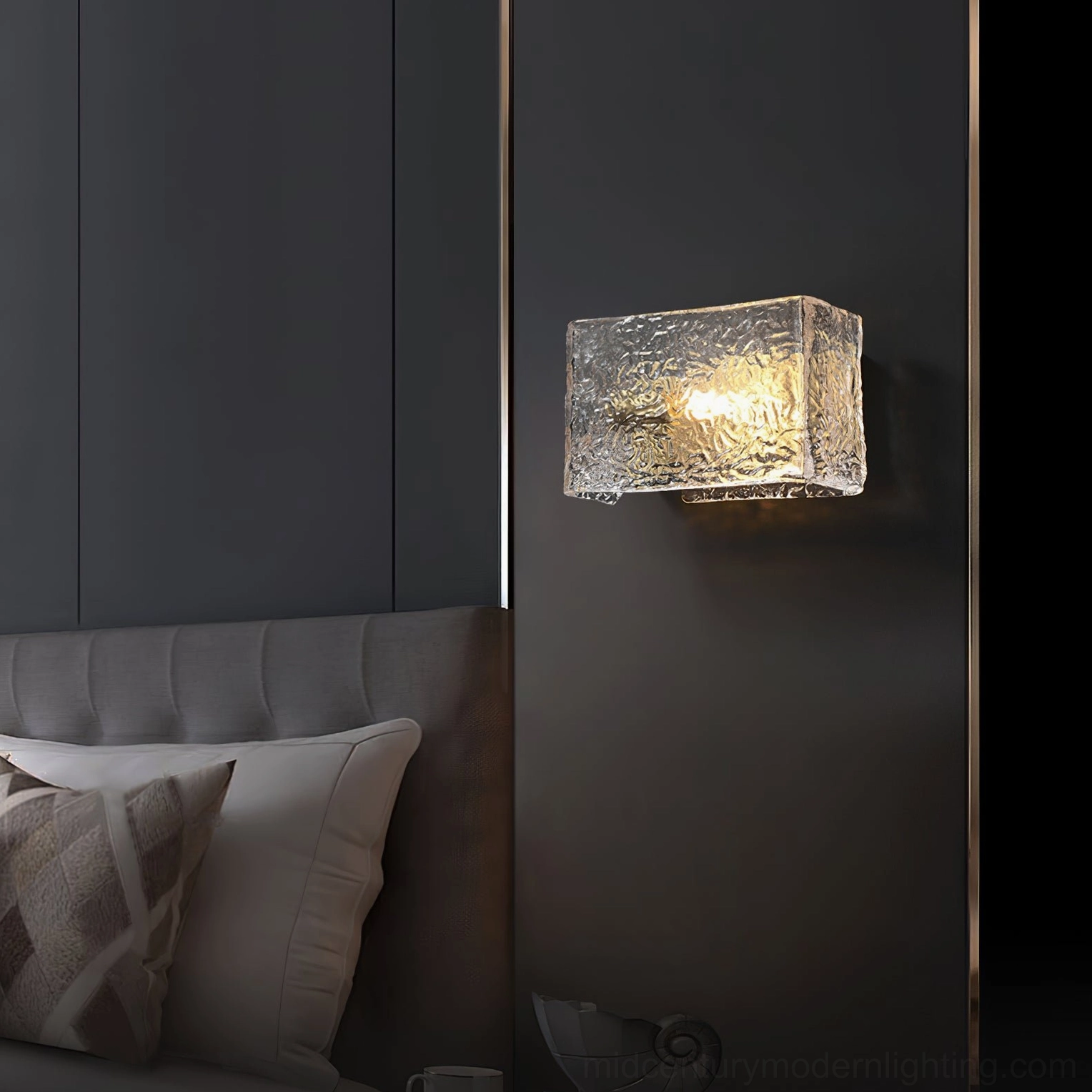 Lunea wall lamp installed on dark panel wall in modern bedroom, side view with soft ambient lighting