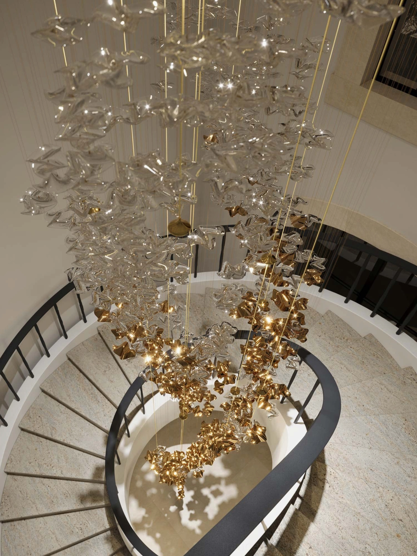 Luxury cascade chandelier warm ambient glow refracted through hand formed glass elements