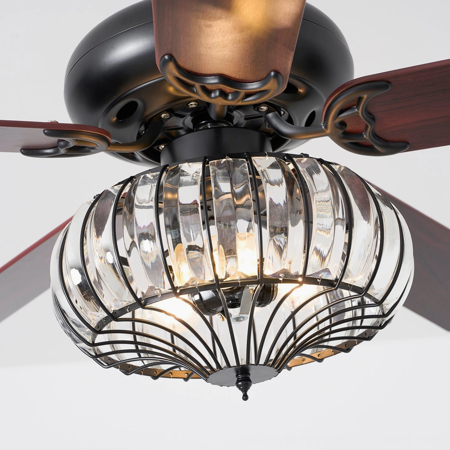 Luxury ceiling fan light with crystal diffuser in elegantly decorated room, demonstrating design versatility and style integration