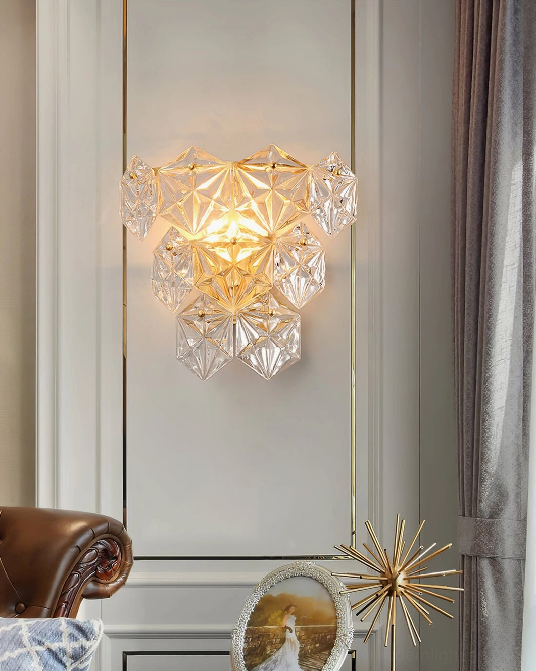 Large layered geometric crystal wall lamp with bright warm glow in luxury living room accent wall