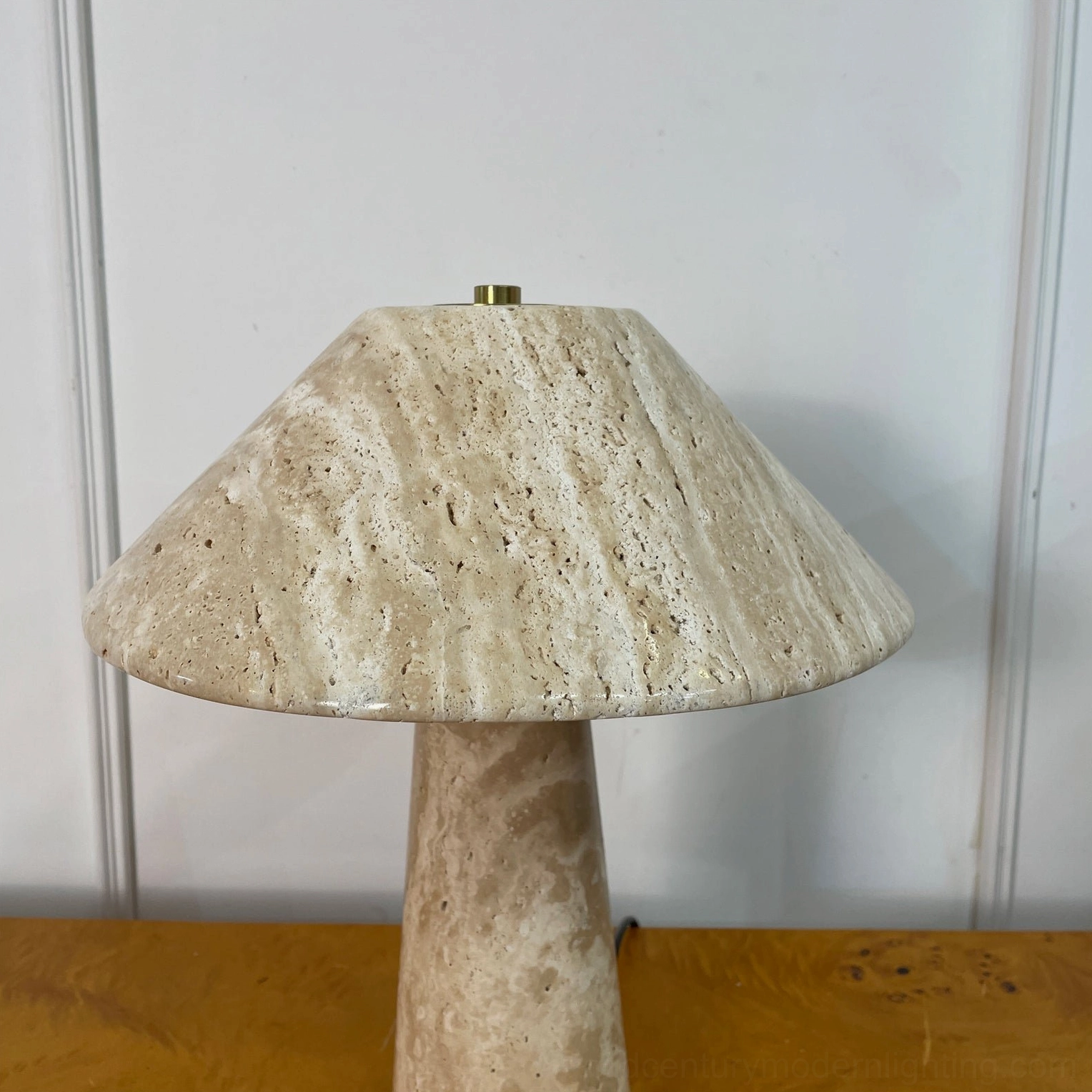Lydia travertine table lamp detail close-up showing natural stone porous texture and organic veining patterns