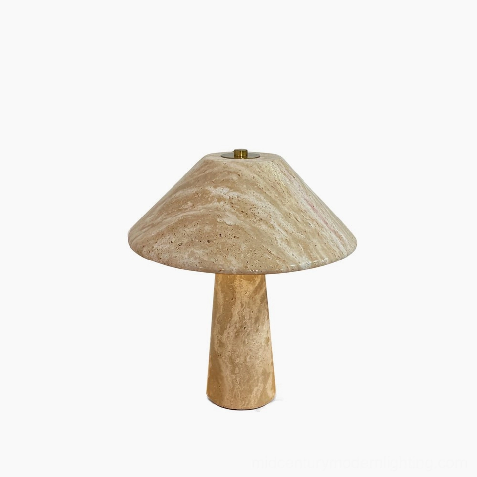 Lydia travertine table lamp front view with mushroom silhouette and brass crown detail on white background