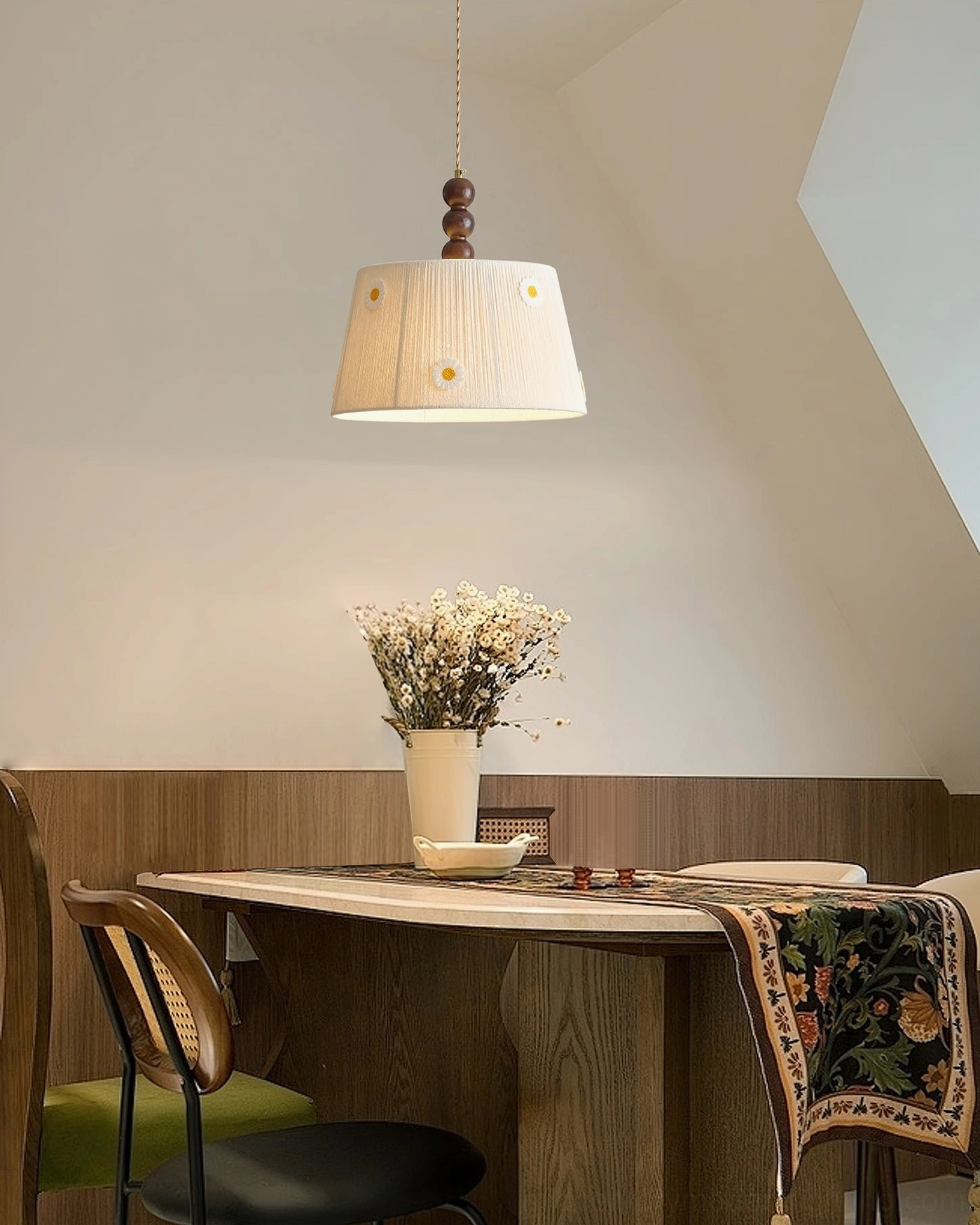 Lytham hand-embroidered daisy pendant light in cozy booth dining nook with warm ambient glow