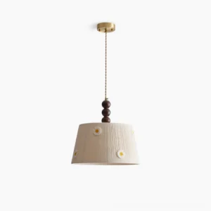 Lytham embroidered daisy pendant light front view with walnut wood finial and brass hardware on white background
