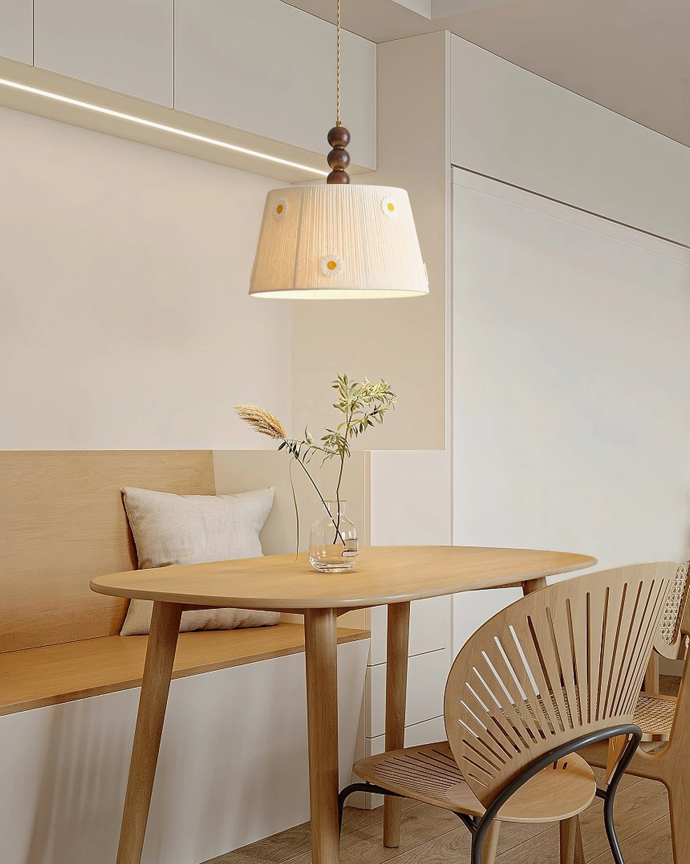 Lytham embroidered daisy pendant light in small home dining area with warm wooden aesthetic