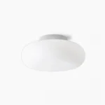 Maga Ellipsoid flush mount ceiling light - minimalist white design with chrome ring base, front studio view