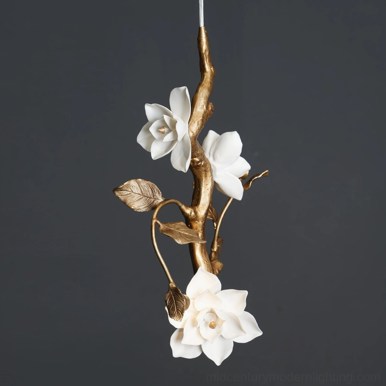 Side view close-up of thylane magnolia pendant light displaying flower arrangement and delicate ceramic leaves