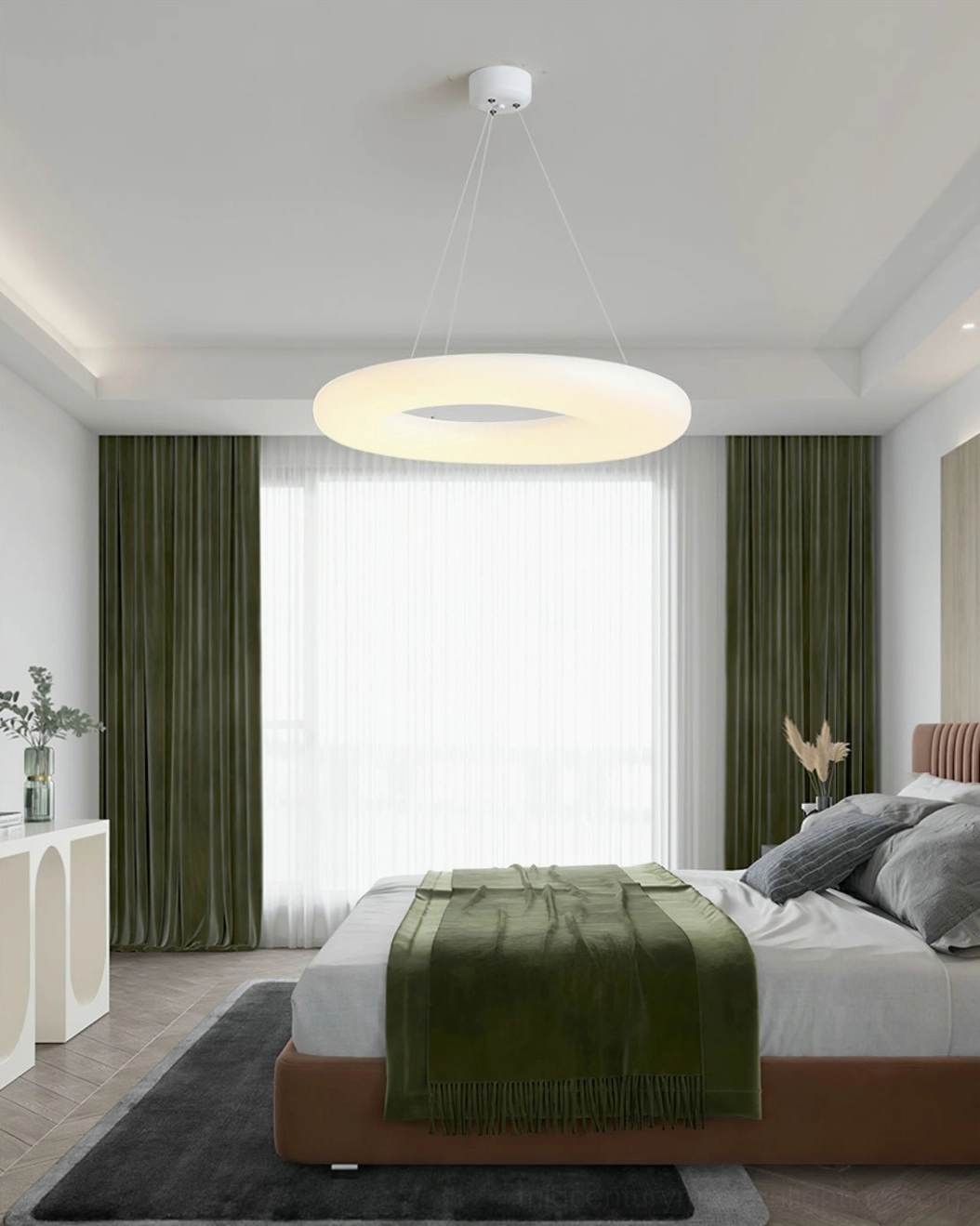 Magoo pendant light fixture installed in modern bedroom with green curtains