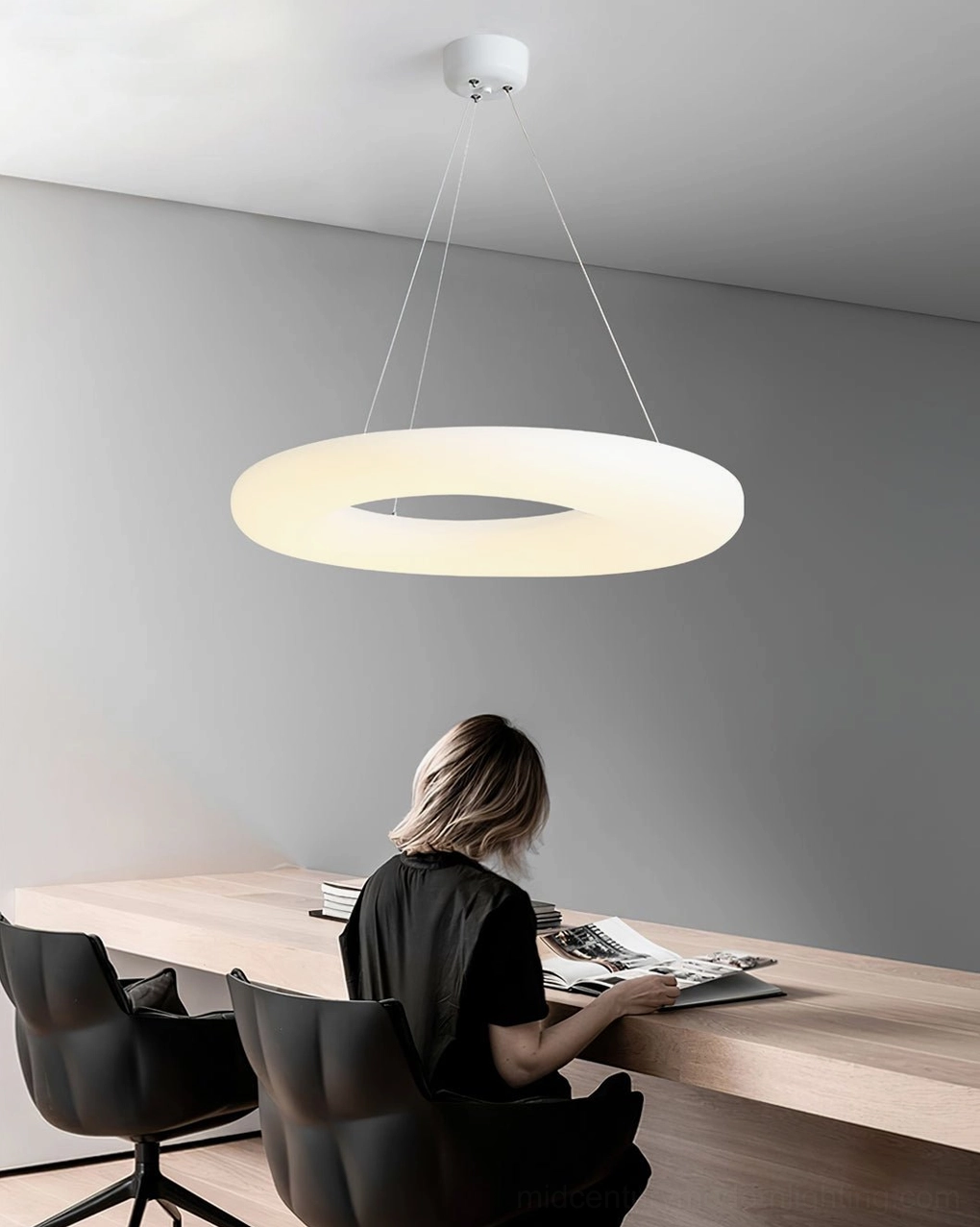 Magoo pendant light showing three-color changing LED capability warm neutral cool