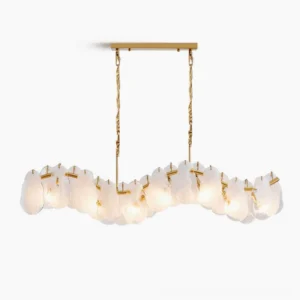 Mahina Cloud linear chandelier with brushed gold brass frame and marbled opaque glass cloud shades, front view studio photography
