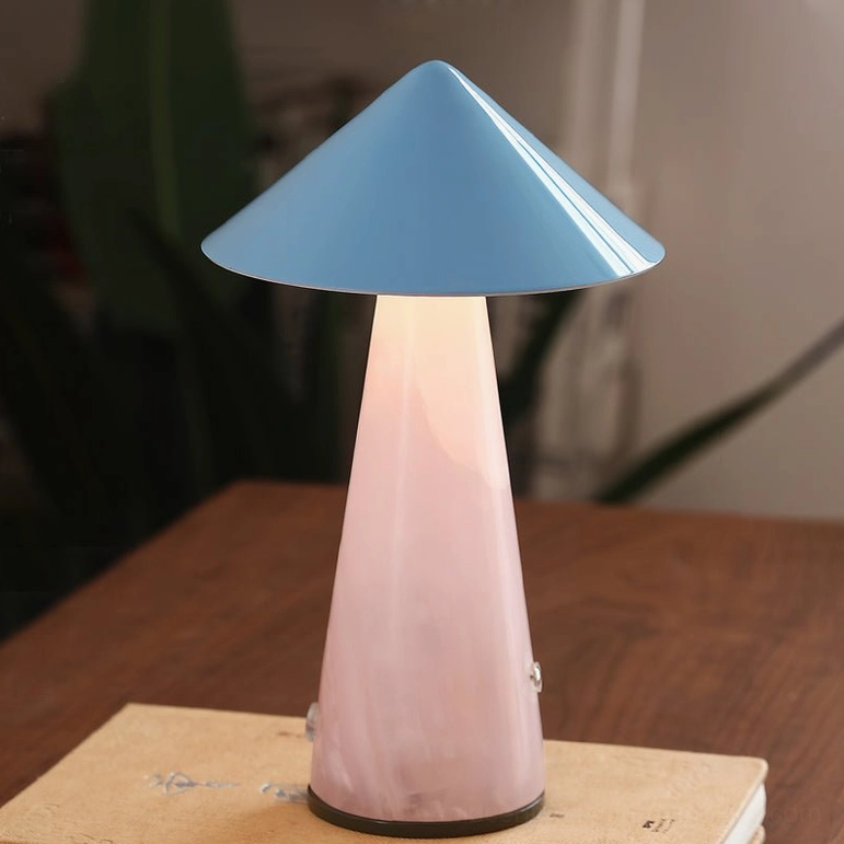 Single Maisie cordless table lamp close-up front view showing glossy cone shade and luminous gradient jade base on wooden tabletop