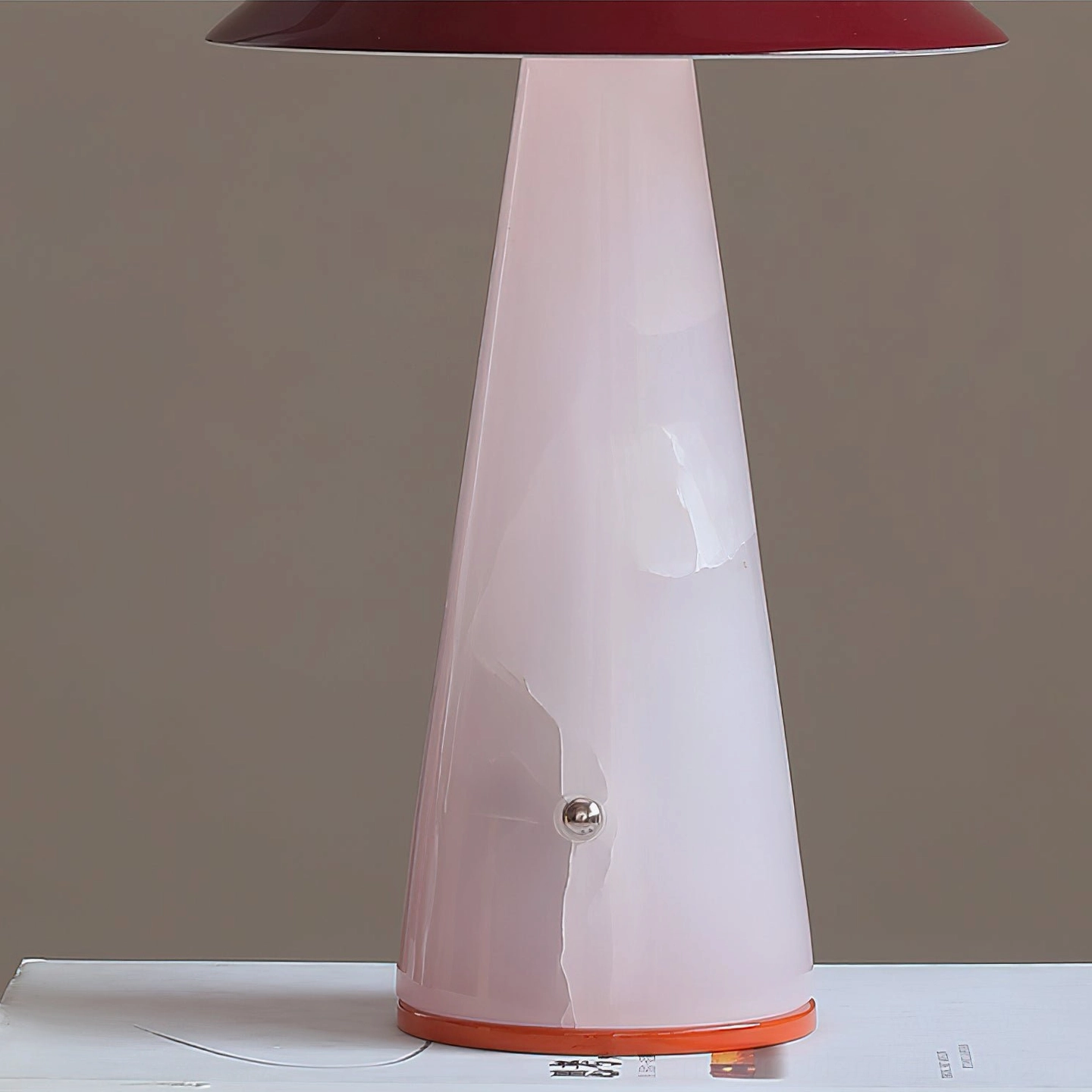 Maisie cordless accent lamp demonstrating premium jade and metal construction with translucent glowing base design detail