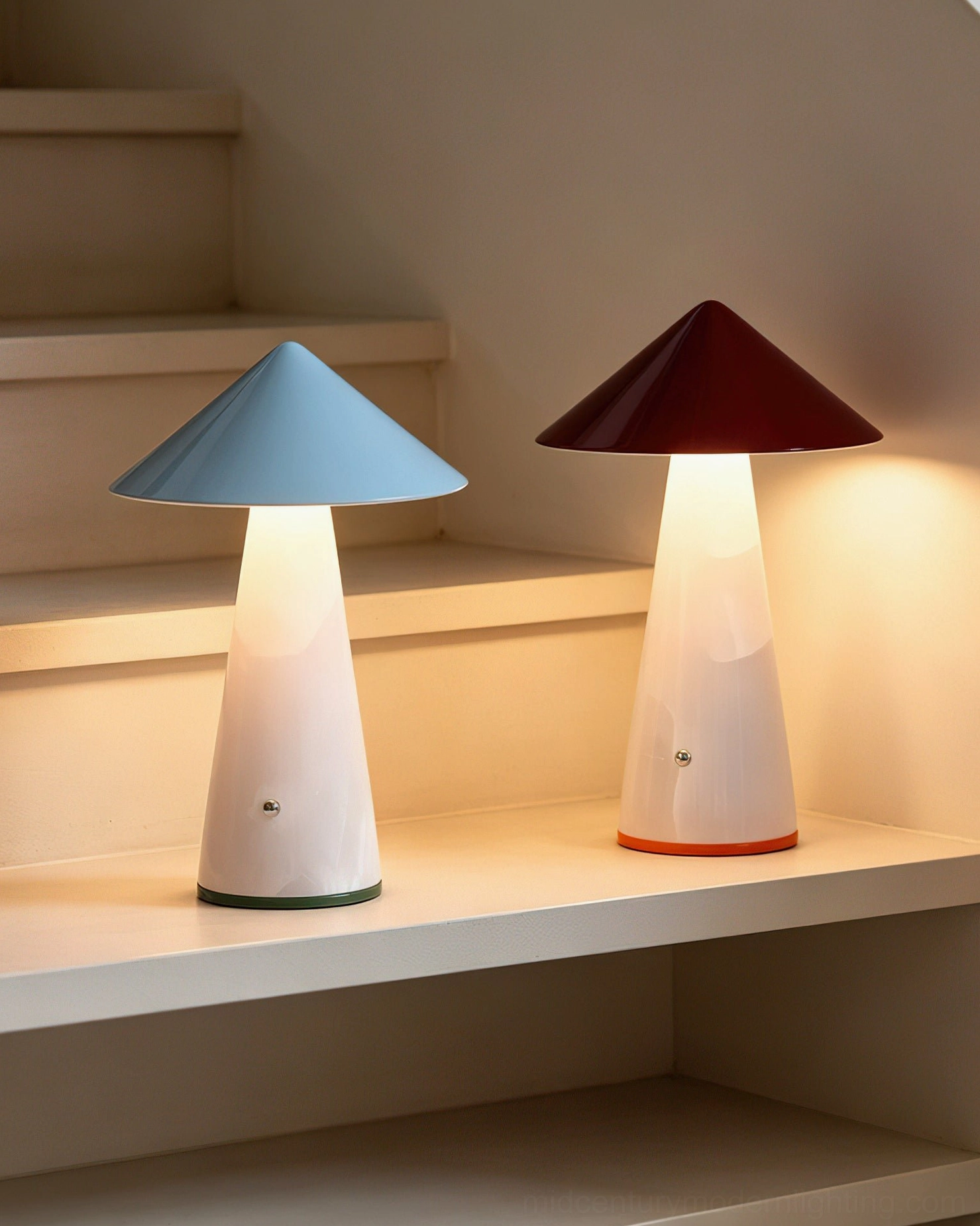 Two Maisie cordless accent lamps on built-in shelf with soft warm lighting, displaying dual color variants in modern interior