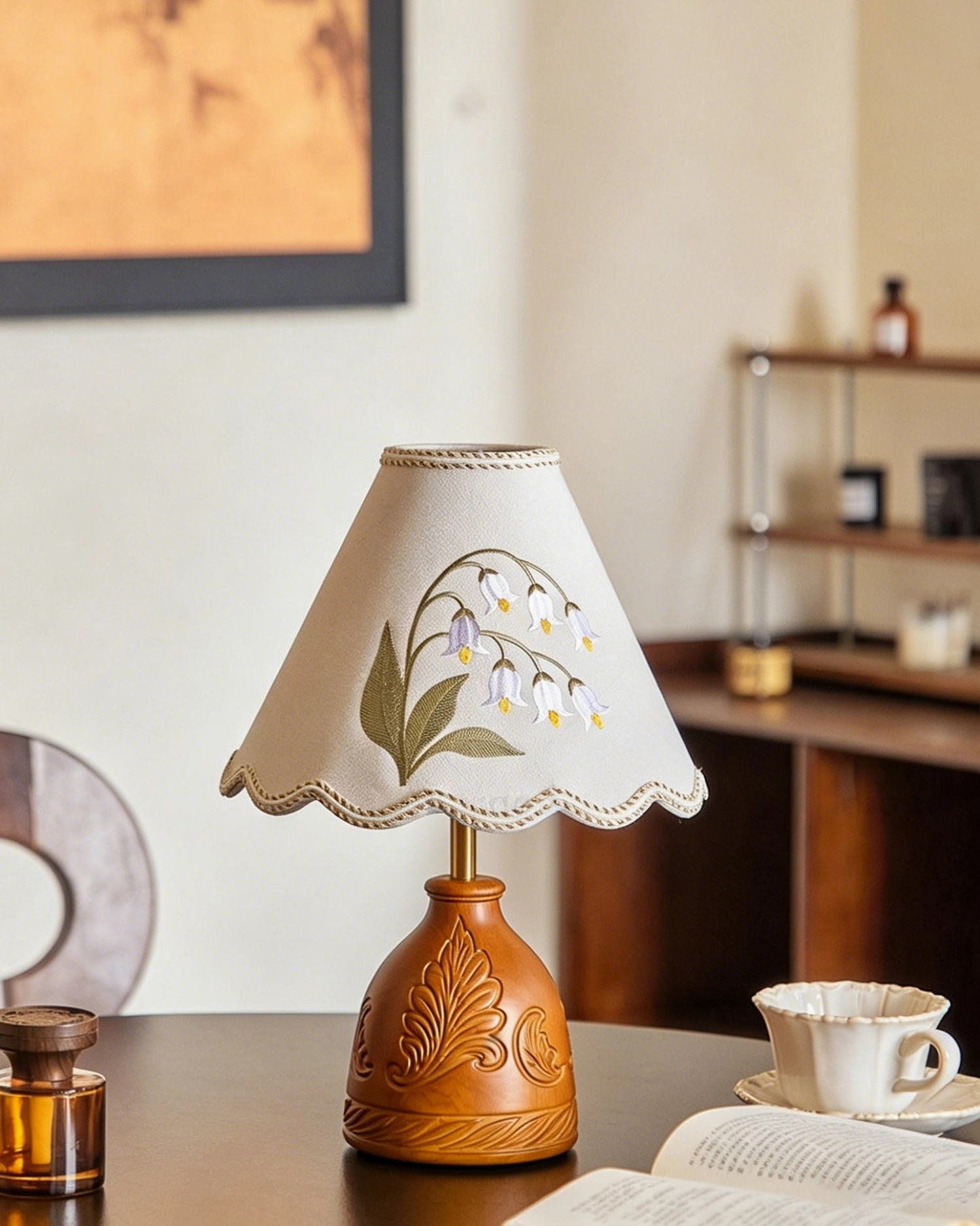 Maisie mid-century modern table lamp positioned as bedroom nightstand accent with warm ambient lighting
